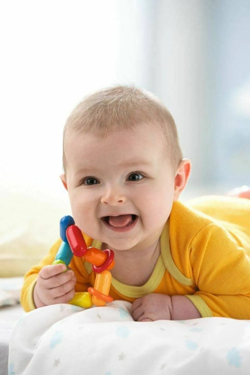 HABA Dilly-Dally Wooden Rattle With Plastic Rings< Grasping + Teething Toys
